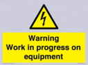 warning-work-in-progress-on-equipmentwith-electrical-hazard-symbol~